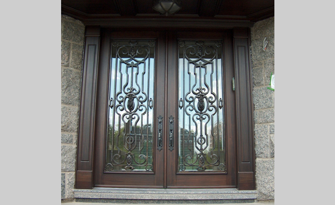 Front door in wooden bourassa
